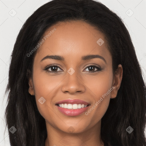 Joyful latino young-adult female with long  brown hair and brown eyes