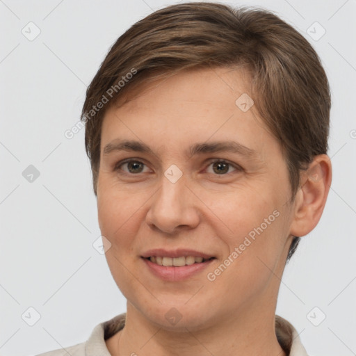 Joyful white young-adult female with short  brown hair and brown eyes