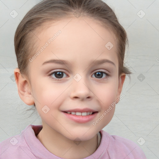 Joyful white child female with short  brown hair and brown eyes