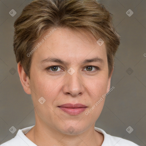 Joyful white adult female with short  brown hair and brown eyes