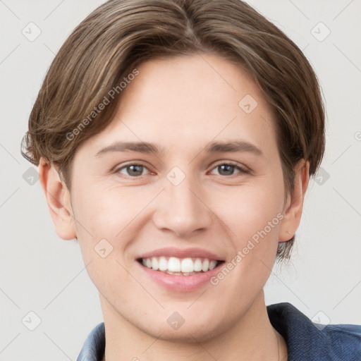 Joyful white young-adult female with short  brown hair and grey eyes