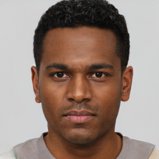 Neutral black young-adult male with short  brown hair and brown eyes