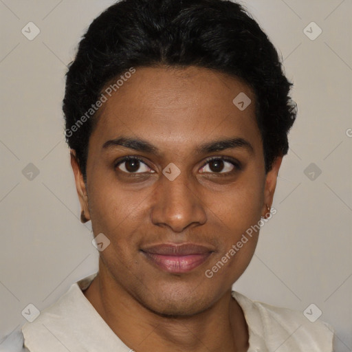 Joyful black young-adult male with short  black hair and brown eyes