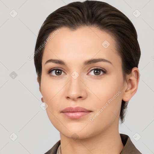 Neutral white young-adult female with short  brown hair and brown eyes