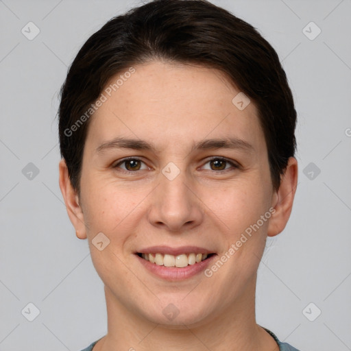 Joyful white young-adult female with short  brown hair and brown eyes