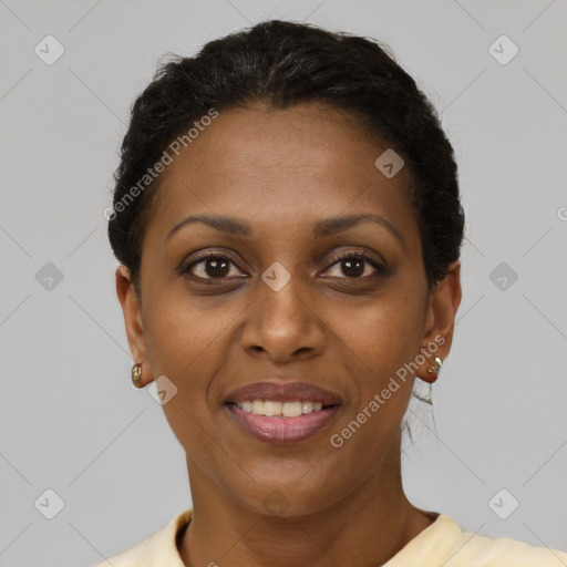 Joyful black adult female with short  brown hair and brown eyes