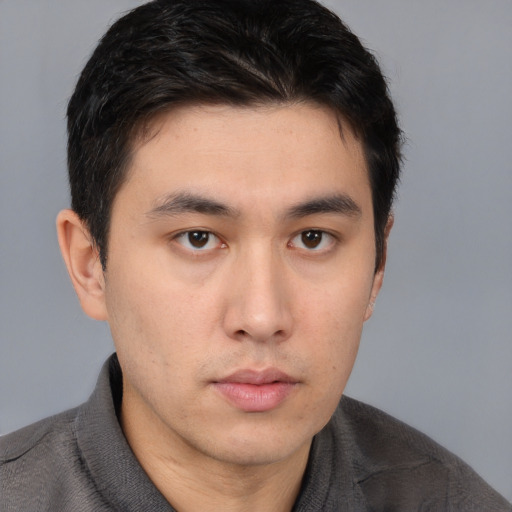 Neutral asian young-adult male with short  brown hair and brown eyes