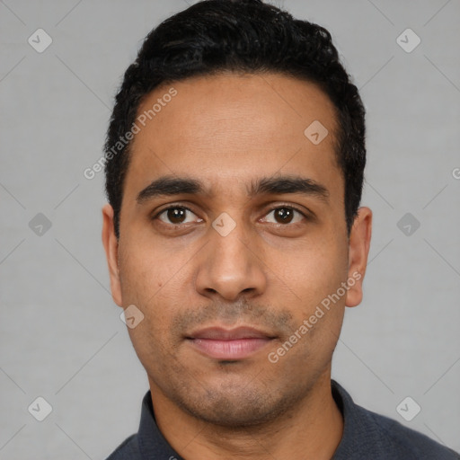 Neutral latino young-adult male with short  black hair and brown eyes