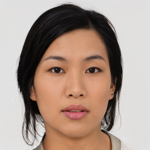 Neutral asian young-adult female with medium  black hair and brown eyes