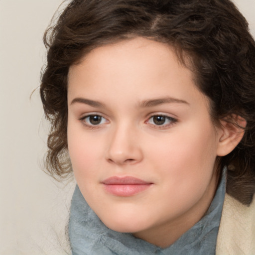 Joyful white child female with medium  brown hair and brown eyes