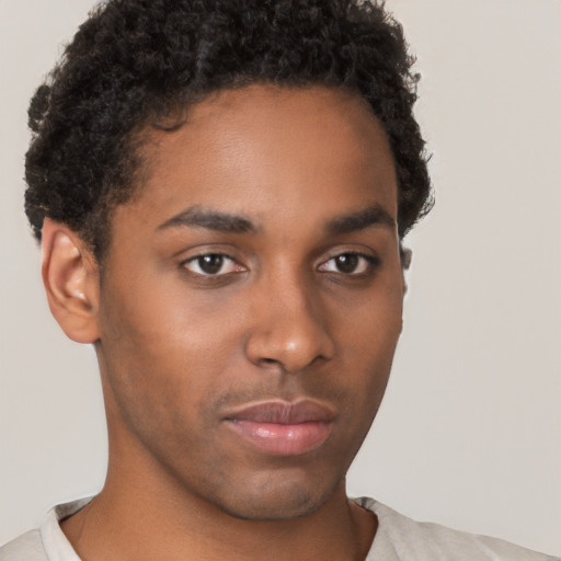 Neutral black young-adult male with short  brown hair and brown eyes