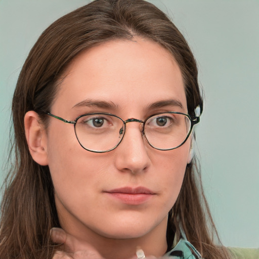 Neutral white young-adult female with medium  brown hair and brown eyes