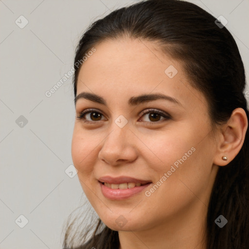 Joyful white young-adult female with long  brown hair and brown eyes