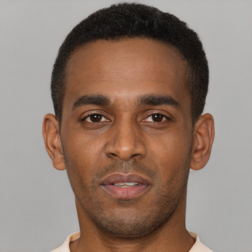 Neutral latino young-adult male with short  black hair and brown eyes