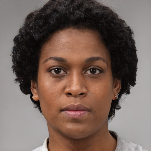 Neutral black young-adult female with short  brown hair and brown eyes