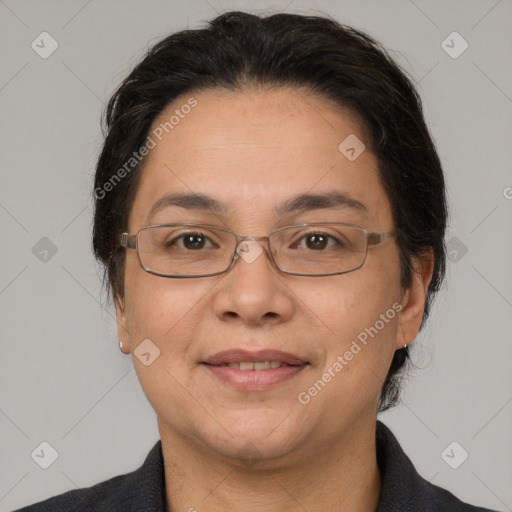 Joyful white adult female with medium  brown hair and brown eyes