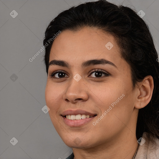 Joyful white young-adult female with long  brown hair and brown eyes