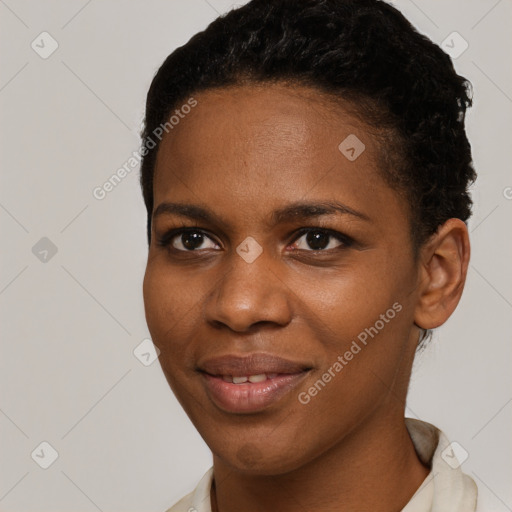 Joyful black young-adult female with short  brown hair and brown eyes