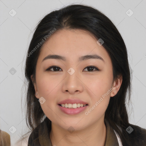 Joyful asian young-adult female with medium  black hair and brown eyes