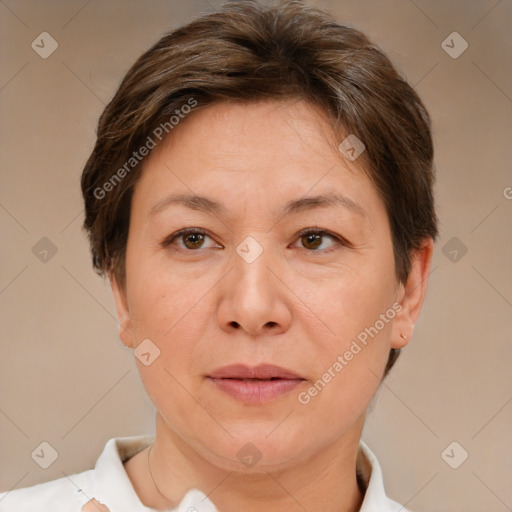 Joyful white adult female with short  brown hair and brown eyes