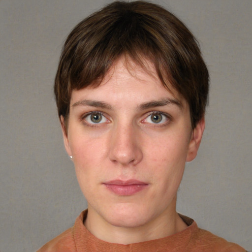 Neutral white young-adult female with short  brown hair and grey eyes