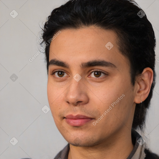 Neutral latino young-adult male with short  black hair and brown eyes