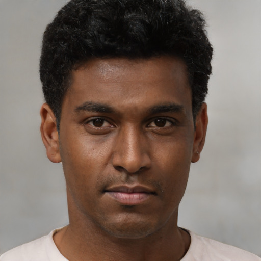 Neutral black young-adult male with short  brown hair and brown eyes