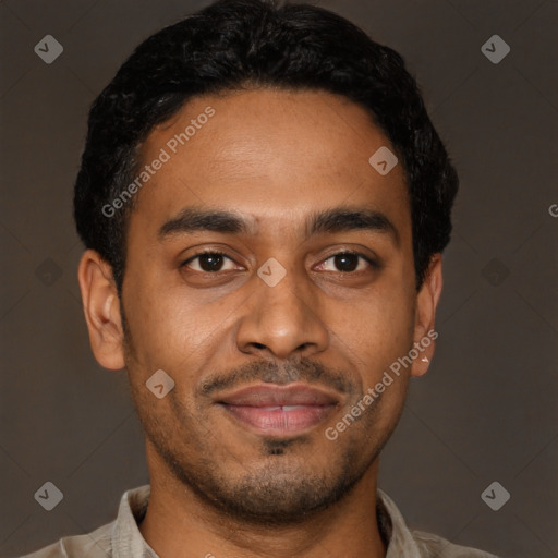 Joyful latino young-adult male with short  black hair and brown eyes