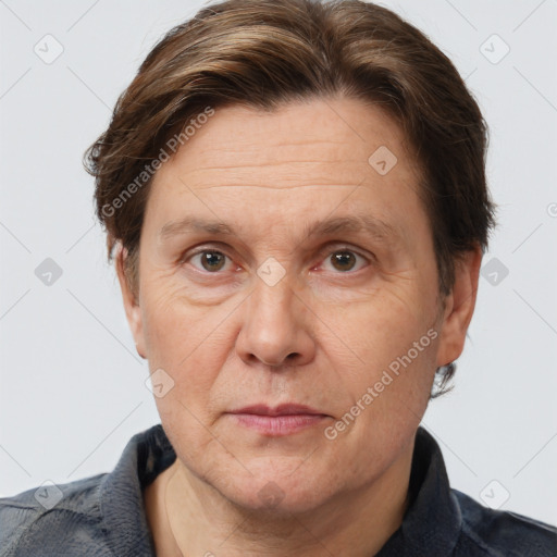 Joyful white adult male with short  brown hair and grey eyes