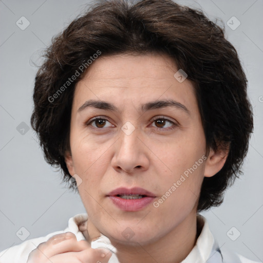 Joyful white adult female with short  brown hair and brown eyes