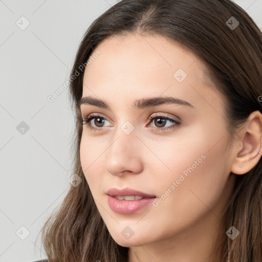 Neutral white young-adult female with long  brown hair and brown eyes