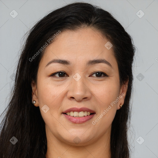 Joyful asian young-adult female with long  brown hair and brown eyes