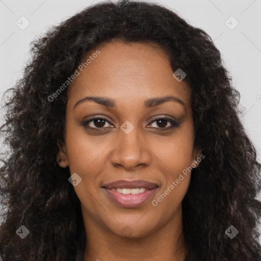 Joyful black young-adult female with long  brown hair and brown eyes