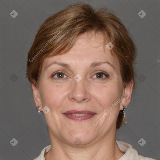 Joyful white adult female with short  brown hair and brown eyes