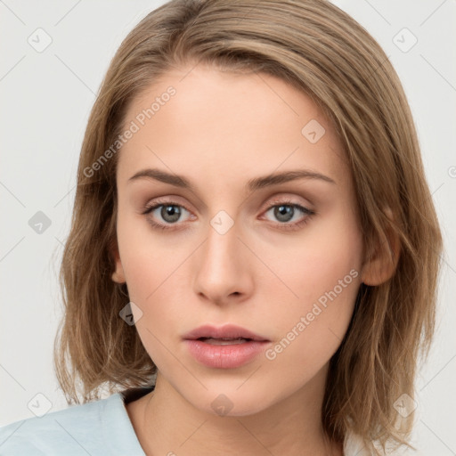 Neutral white young-adult female with medium  brown hair and grey eyes