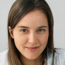 Joyful white young-adult female with long  brown hair and blue eyes