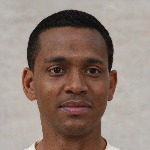 Neutral black young-adult male with short  black hair and brown eyes