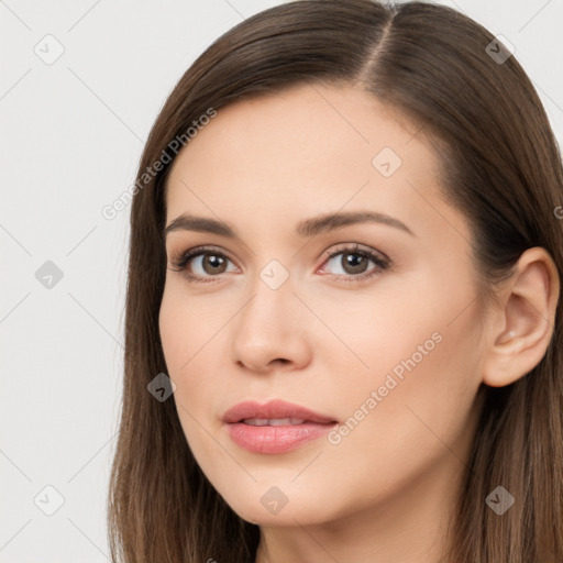 Neutral white young-adult female with long  brown hair and brown eyes