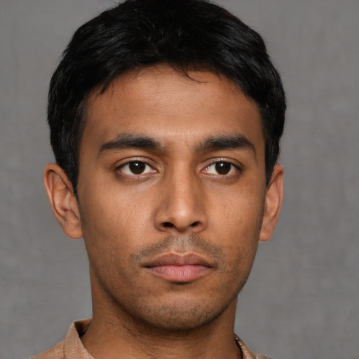 Neutral asian young-adult male with short  brown hair and brown eyes