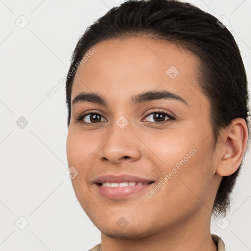 Joyful white young-adult female with long  brown hair and brown eyes