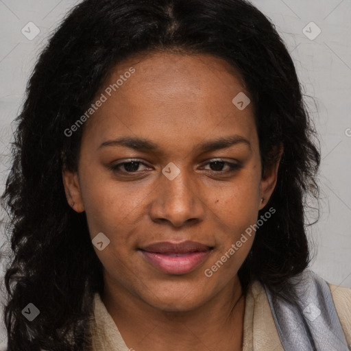 Joyful black young-adult female with long  brown hair and brown eyes