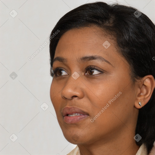 Neutral black young-adult female with short  black hair and brown eyes