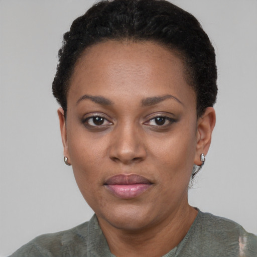 Neutral black young-adult female with short  black hair and brown eyes