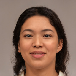 Joyful asian young-adult female with medium  brown hair and brown eyes