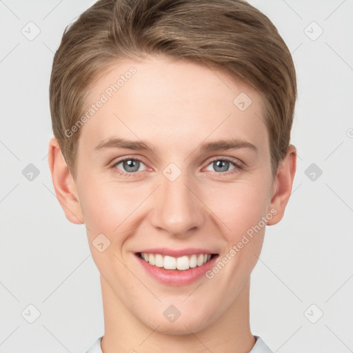 Joyful white young-adult female with short  brown hair and grey eyes