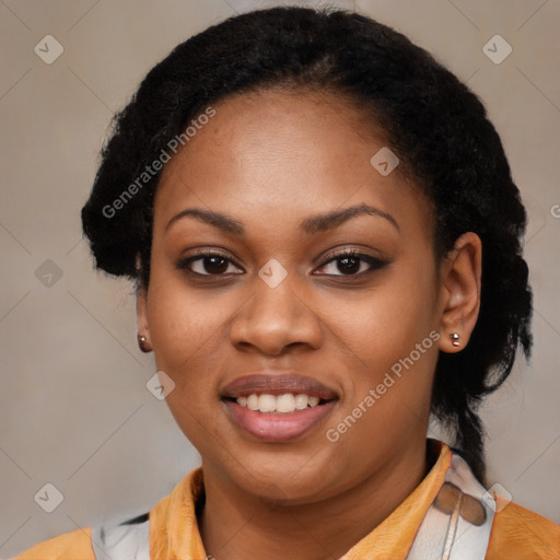 Joyful latino young-adult female with short  black hair and brown eyes