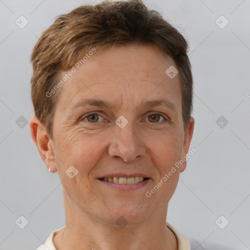 Joyful white adult female with short  brown hair and brown eyes