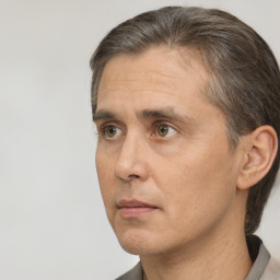 Neutral white adult male with short  brown hair and brown eyes