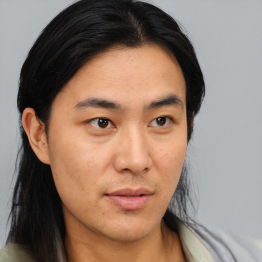 Neutral asian young-adult male with medium  brown hair and brown eyes