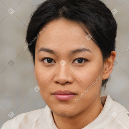 Joyful asian young-adult female with short  brown hair and brown eyes